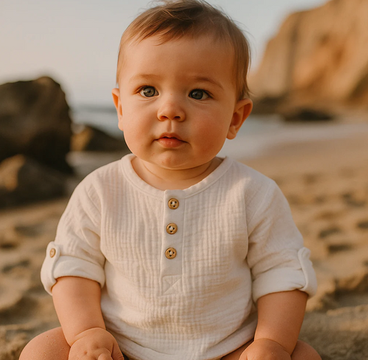Toddler wearing soft tagless cotton clothing designed for comfort and sensitive skin.
